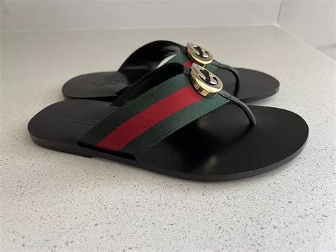 black guy wears pink gucci flip flops|authentic gucci slides.